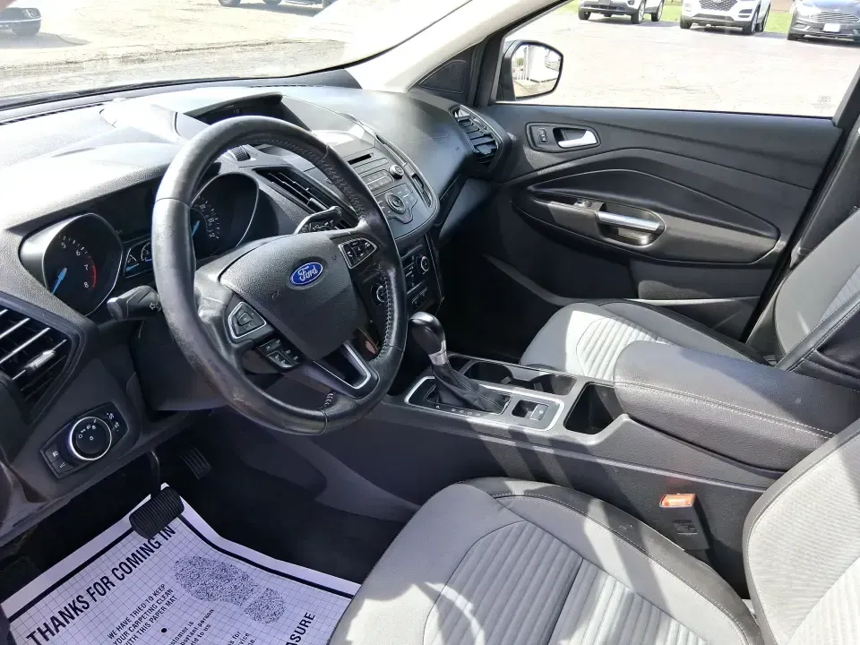 2017 Ford Escape SE (1FMCU9GD2HU) with an 1.5L L4 DOHC 16V engine, 6A transmission, located at 880 E. National Road, Vandalia, OH, 45377, (937) 908-9800, 39.891918, -84.183594 - Make every day easier-whether you're tackling a long commute up I-75, shuttling kids between school and practice, or packing up for a weekend escape to the Dayton area parks. This 2017 Ford Escape SE in Magnetic Metallic is the kind of compact SUV that fits real life in Vandalia, OH: easy to park, c - Photo#8