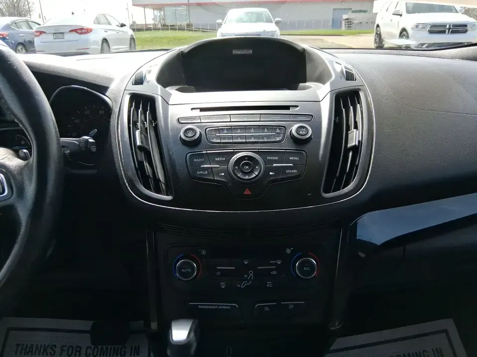 2017 Ford Escape SE (1FMCU9GD2HU) with an 1.5L L4 DOHC 16V engine, 6A transmission, located at 880 E. National Road, Vandalia, OH, 45377, (937) 908-9800, 39.891918, -84.183594 - Make every day easier-whether you're tackling a long commute up I-75, shuttling kids between school and practice, or packing up for a weekend escape to the Dayton area parks. This 2017 Ford Escape SE in Magnetic Metallic is the kind of compact SUV that fits real life in Vandalia, OH: easy to park, c - Photo#12