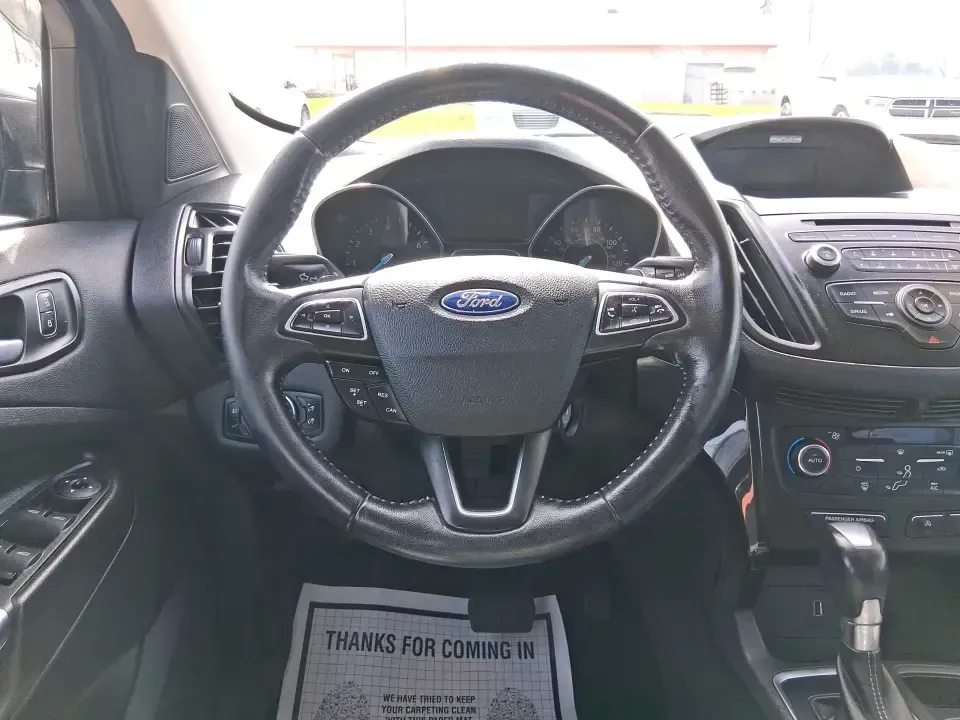 2017 Ford Escape SE (1FMCU9GD2HU) with an 1.5L L4 DOHC 16V engine, 6A transmission, located at 880 E. National Road, Vandalia, OH, 45377, (937) 908-9800, 39.891918, -84.183594 - Make every day easier-whether you're tackling a long commute up I-75, shuttling kids between school and practice, or packing up for a weekend escape to the Dayton area parks. This 2017 Ford Escape SE in Magnetic Metallic is the kind of compact SUV that fits real life in Vandalia, OH: easy to park, c - Photo#15