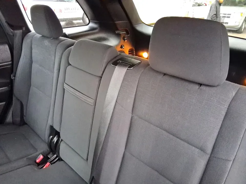 2015 Jeep Grand Cherokee Laredo (1C4RJFAG5FC) with an 3.6L V-6 DOHC engine, 8-Speed Automatic transmission, located at 1099 N County Rd 25A , Troy, OH, 45373, (937) 908-9800, 40.057079, -84.212883 - Need one SUV that can handle school drop-offs in the morning, a smooth I75 commute at lunchtime, and a last-minute weekend escape to the Miami Valley trails? This 2015 Jeep Grand Cherokee Laredo 4WD is built for real life in Troy, Ohio-comfortable enough for daily driving, confident enough for unpre - Photo#10