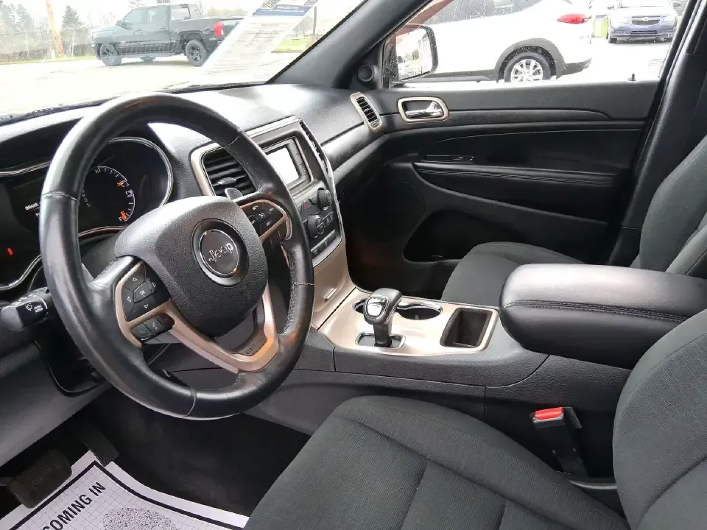 2015 Jeep Grand Cherokee Laredo (1C4RJFAG5FC) with an 3.6L V-6 DOHC engine, 8-Speed Automatic transmission, located at 1951 S Dayton Lakeview Rd., New Carlisle, OH, 45344, (937) 908-9800, 39.890999, -84.050255 - Need one SUV that can handle school drop-offs in the morning, a smooth I75 commute at lunchtime, and a last-minute weekend escape to the Miami Valley trails? This 2015 Jeep Grand Cherokee Laredo 4WD is built for real life in Troy, Ohio-comfortable enough for daily driving, confident enough for unpre - Photo#9