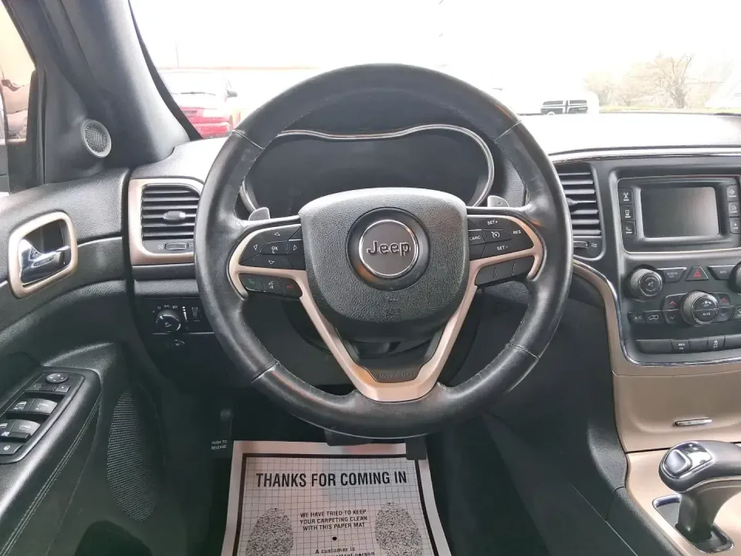 2015 Jeep Grand Cherokee Laredo (1C4RJFAG5FC) with an 3.6L V-6 DOHC engine, 8-Speed Automatic transmission, located at 1951 S Dayton Lakeview Rd., New Carlisle, OH, 45344, (937) 908-9800, 39.890999, -84.050255 - Need one SUV that can handle school drop-offs in the morning, a smooth I75 commute at lunchtime, and a last-minute weekend escape to the Miami Valley trails? This 2015 Jeep Grand Cherokee Laredo 4WD is built for real life in Troy, Ohio-comfortable enough for daily driving, confident enough for unpre - Photo#16