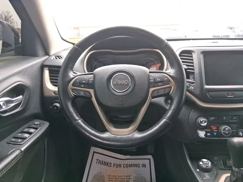 2015 Jeep Cherokee Limited (1C4PJMDBXFW) with an 2.4L L4 DOHC 16V engine, 9-Speed Automatic transmission, located at 1230 East Main St, Xenia, OH, 45385, (937) 908-9800, 39.688026, -83.910172 - Need one vehicle that can handle the weekday grind and still feel ready for a last-minute getaway? This 2015 Jeep Cherokee Limited 4WD in Brilliant Black Crystal Pearlcoat is built for Riverside life-comfortable for daily commutes, confident in Ohio weather, and versatile enough for road trips, socc - Photo#16