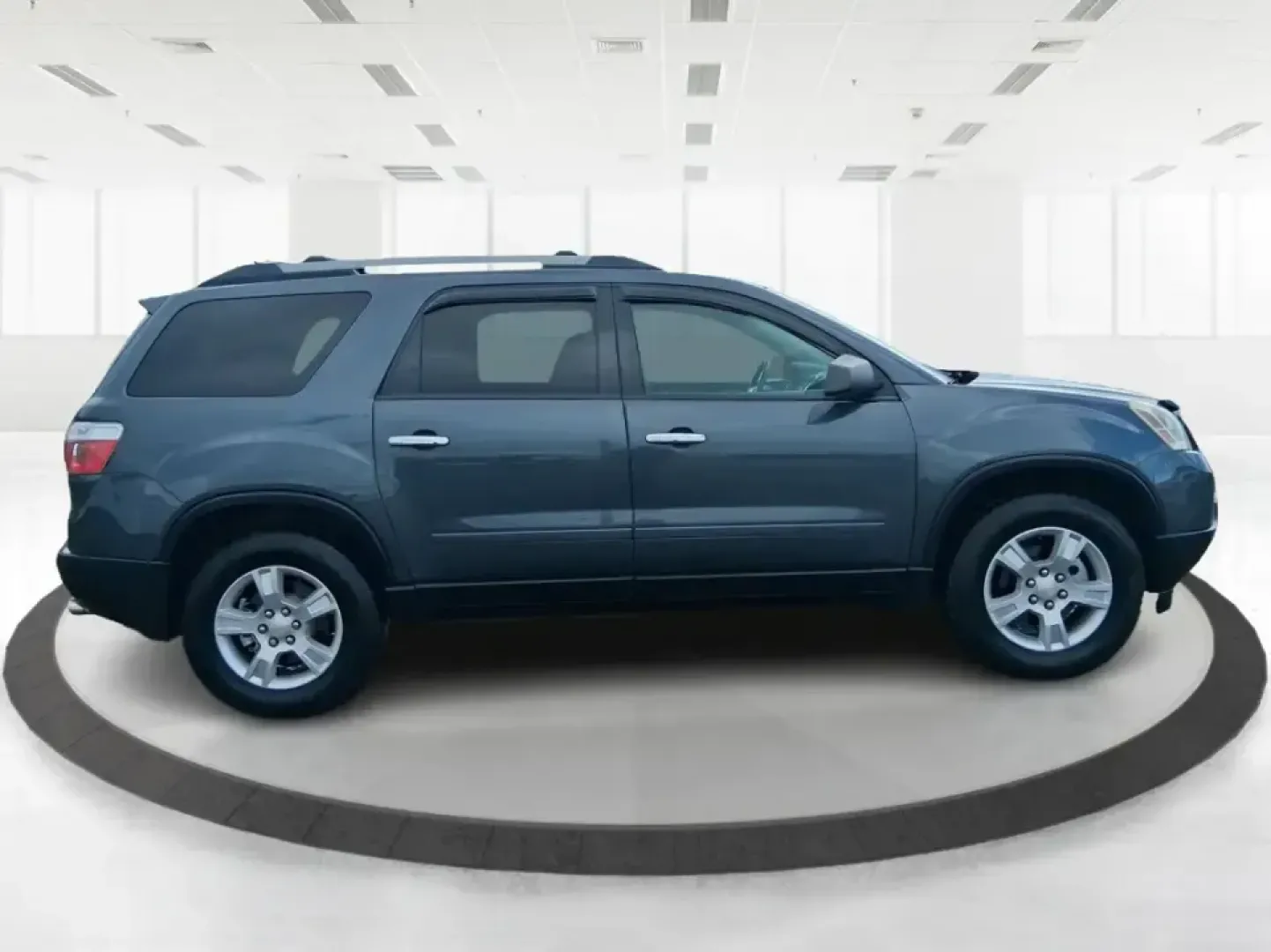 2012 GMC Acadia SL (1GKKRNED6CJ) with an 3.6L V-6 gasoline direct injection engine, 6-Speed Automatic transmission, located at 8750 N County Rd 25A, Piqua, OH, 45356, (937) 908-9800, 40.164391, -84.232513 - Pack up the kids, load the cooler, and point the SUV toward your next weekend getaway-this 2012 GMC Acadia SL is built for real-life Ohio driving, from school drop-offs and long commutes to road trips up I-75 and errands around Piqua. With three-row versatility, confident road manners, and family-fr - Photo#1
