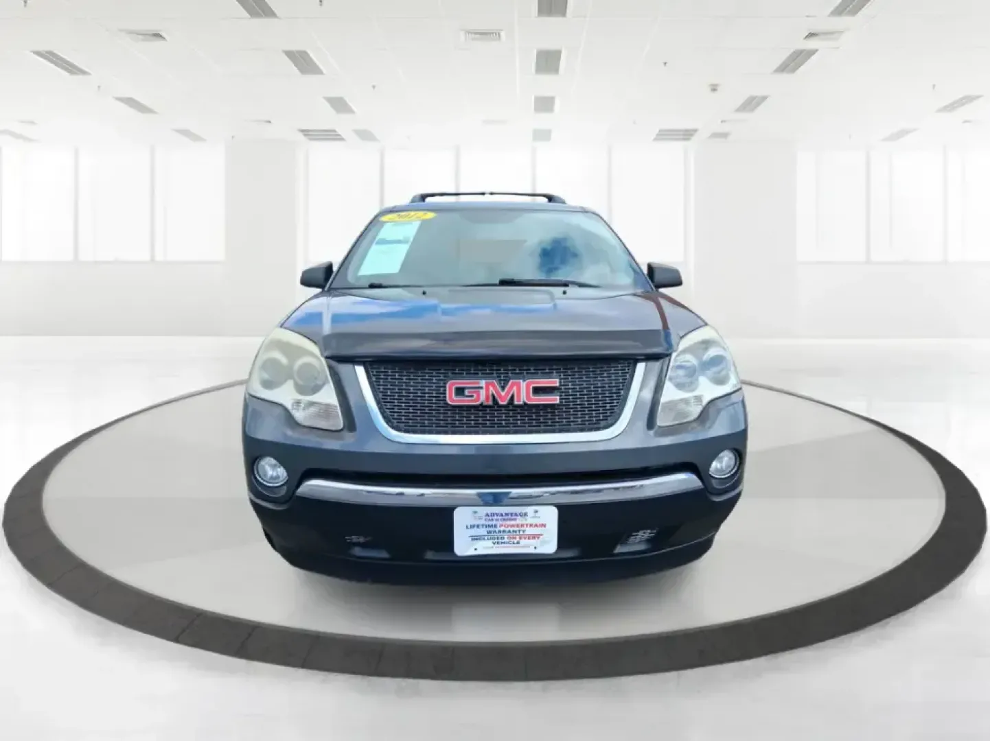 2012 GMC Acadia SL (1GKKRNED6CJ) with an 3.6L V-6 gasoline direct injection engine, 6-Speed Automatic transmission, located at 8750 N County Rd 25A, Piqua, OH, 45356, (937) 908-9800, 40.164391, -84.232513 - Pack up the kids, load the cooler, and point the SUV toward your next weekend getaway-this 2012 GMC Acadia SL is built for real-life Ohio driving, from school drop-offs and long commutes to road trips up I-75 and errands around Piqua. With three-row versatility, confident road manners, and family-fr - Photo#7