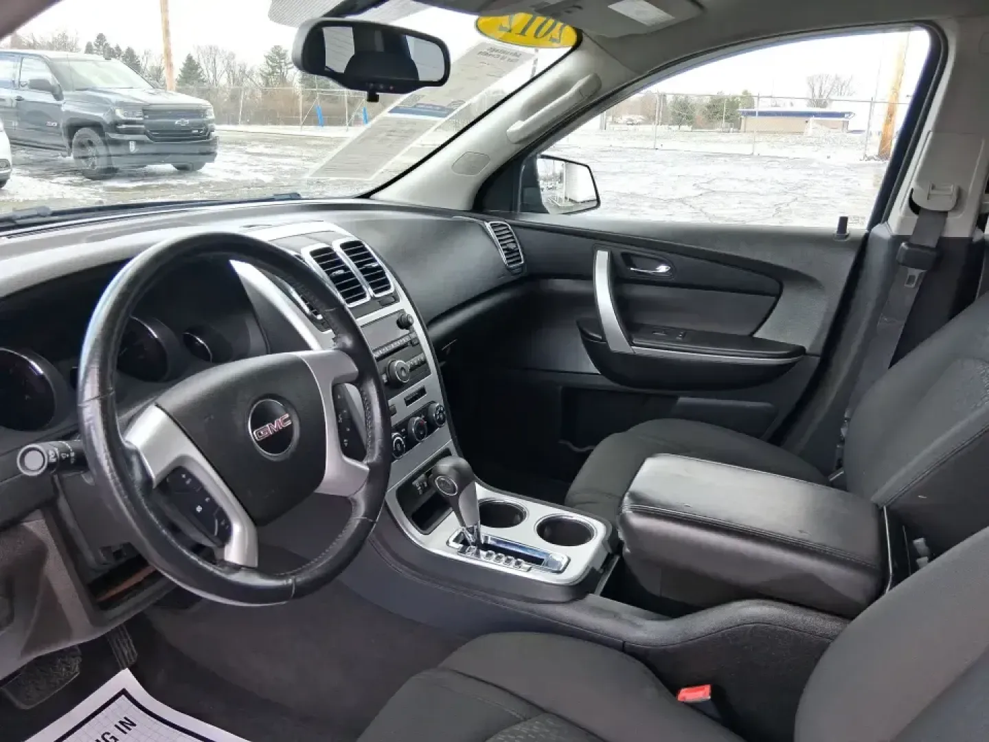 2012 GMC Acadia SL (1GKKRNED6CJ) with an 3.6L V-6 gasoline direct injection engine, 6-Speed Automatic transmission, located at 8750 N County Rd 25A, Piqua, OH, 45356, (937) 908-9800, 40.164391, -84.232513 - Pack up the kids, load the cooler, and point the SUV toward your next weekend getaway-this 2012 GMC Acadia SL is built for real-life Ohio driving, from school drop-offs and long commutes to road trips up I-75 and errands around Piqua. With three-row versatility, confident road manners, and family-fr - Photo#9