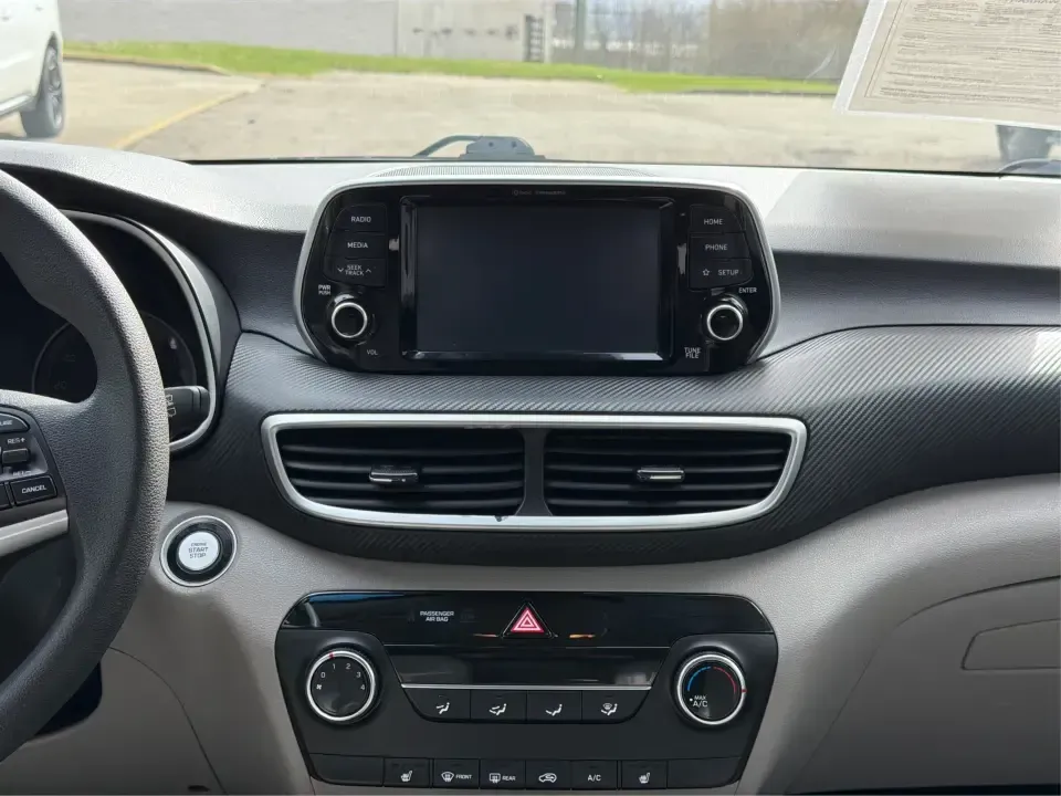 2019 Hyundai Tucson Value (KM8J33A41KU) with an Nu 2L I-4 gasoline direct injection engine, 6A transmission, located at 8750 N County Rd 25A, Piqua, OH, 45356, (937) 908-9800, 40.164391, -84.232513 - Picture your next Ohio weekend: loading up the cooler, tossing sports gear in the back, and cruising from Piqua to a family cookout or a quick getaway-without stressing about space, comfort, or the road ahead. This **2019 Hyundai Tucson Value** in **White Pearl** is the kind of compact SUV that fits - Photo#13