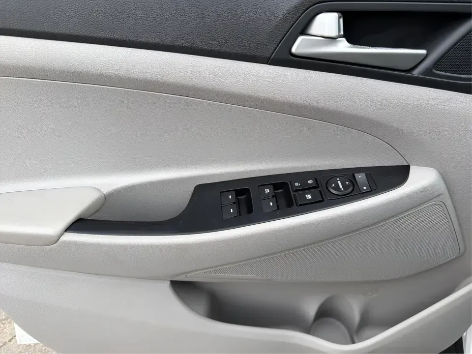 2019 Hyundai Tucson Value (KM8J33A41KU) with an Nu 2L I-4 gasoline direct injection engine, 6A transmission, located at 8750 N County Rd 25A, Piqua, OH, 45356, (937) 908-9800, 40.164391, -84.232513 - Picture your next Ohio weekend: loading up the cooler, tossing sports gear in the back, and cruising from Piqua to a family cookout or a quick getaway-without stressing about space, comfort, or the road ahead. This **2019 Hyundai Tucson Value** in **White Pearl** is the kind of compact SUV that fits - Photo#18