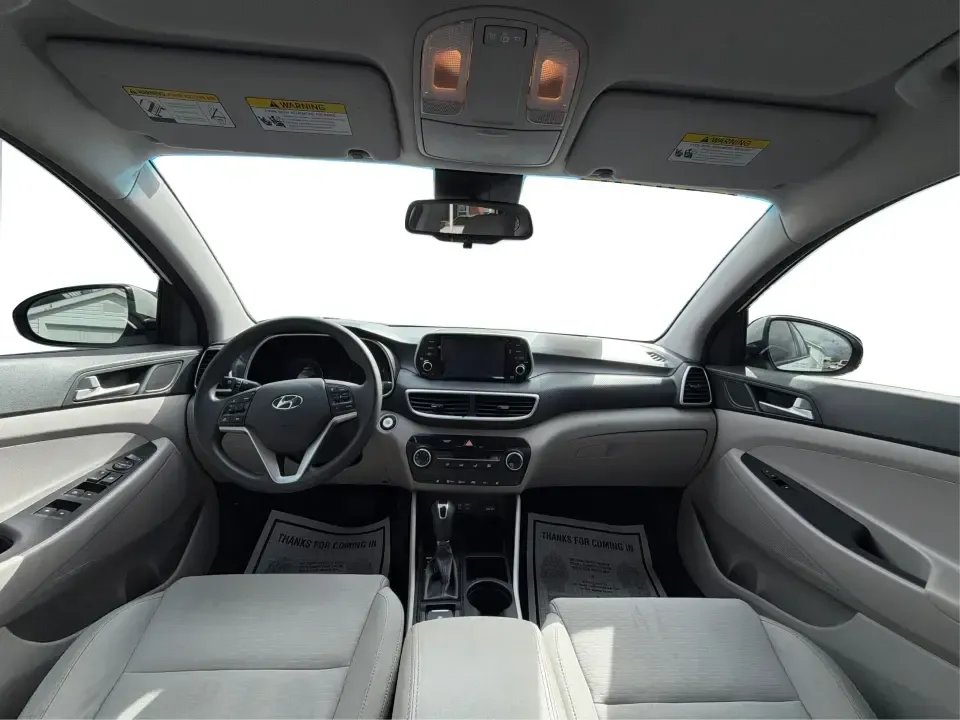 2019 Hyundai Tucson Value (KM8J33A41KU) with an Nu 2L I-4 gasoline direct injection engine, 6A transmission, located at 8750 N County Rd 25A, Piqua, OH, 45356, (937) 908-9800, 40.164391, -84.232513 - Picture your next Ohio weekend: loading up the cooler, tossing sports gear in the back, and cruising from Piqua to a family cookout or a quick getaway-without stressing about space, comfort, or the road ahead. This **2019 Hyundai Tucson Value** in **White Pearl** is the kind of compact SUV that fits - Photo#21