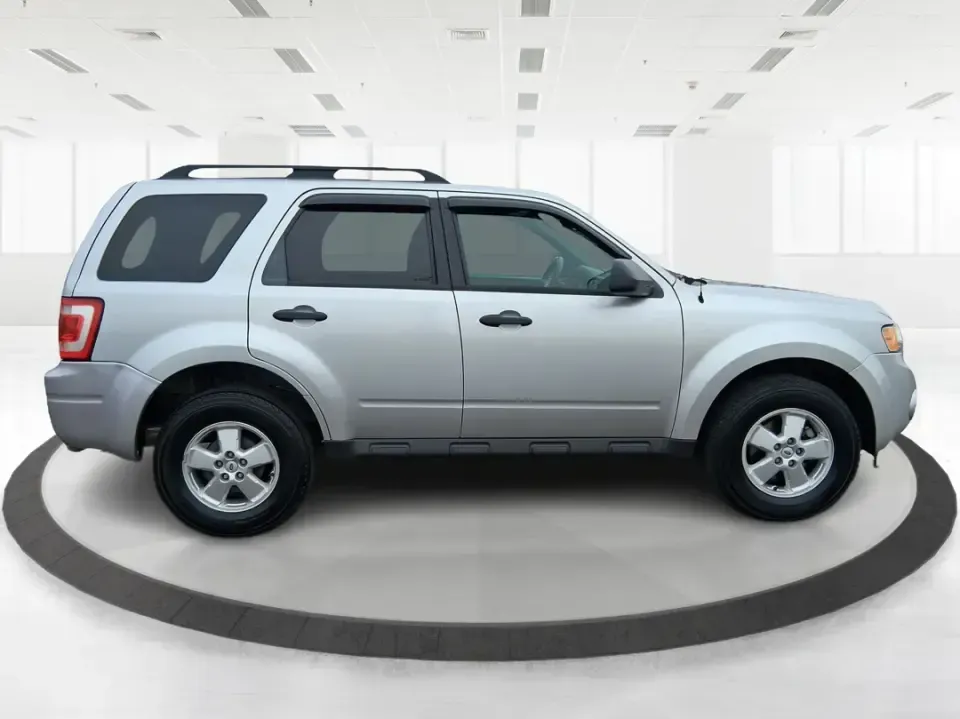 2012 Ford Escape XLT 4WD (1FMCU9D70CK) with an 2.5L L4 DOHC 16V engine, 6-Speed Automatic transmission, located at 880 E. National Road, Vandalia, OH, 45377, (937) 908-9800, 39.891918, -84.183594 - Pack up the kids, the dog, and a weekend's worth of gear-this 2012 Ford Escape XLT 4WD is the kind of SUV that fits real life in Vandalia. Whether you're commuting down I75 toward Dayton, running errands along National Road, or heading out for a quick getaway to Taylorsville MetroPark, the Escape's- Photo#1
