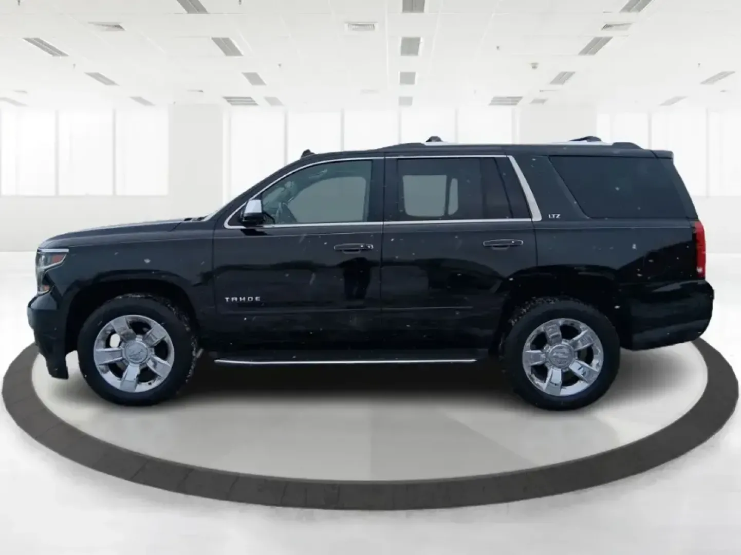 2015 Chevrolet Tahoe LTZ (1GNSKCKC9FR) with an EcoTec3 5.3L V-8 gasoline direct injection engine, 6-Speed Automatic transmission, located at 4508 South Dixie Dr, Moraine, OH, 45439, (937) 908-9800, 39.689976, -84.218452 - Big family weekend at Indian Lake, a road-trip up I-75, or a daily commute with room for coworkers and gear-this 2015 Chevrolet Tahoe LTZ 4WD is built for the kind of life that doesn't fit in a small SUV. Finished in sleek Black and powered by the EcoTec3 5.3L V8 with a smooth 6-speed automatic tran - Photo#5