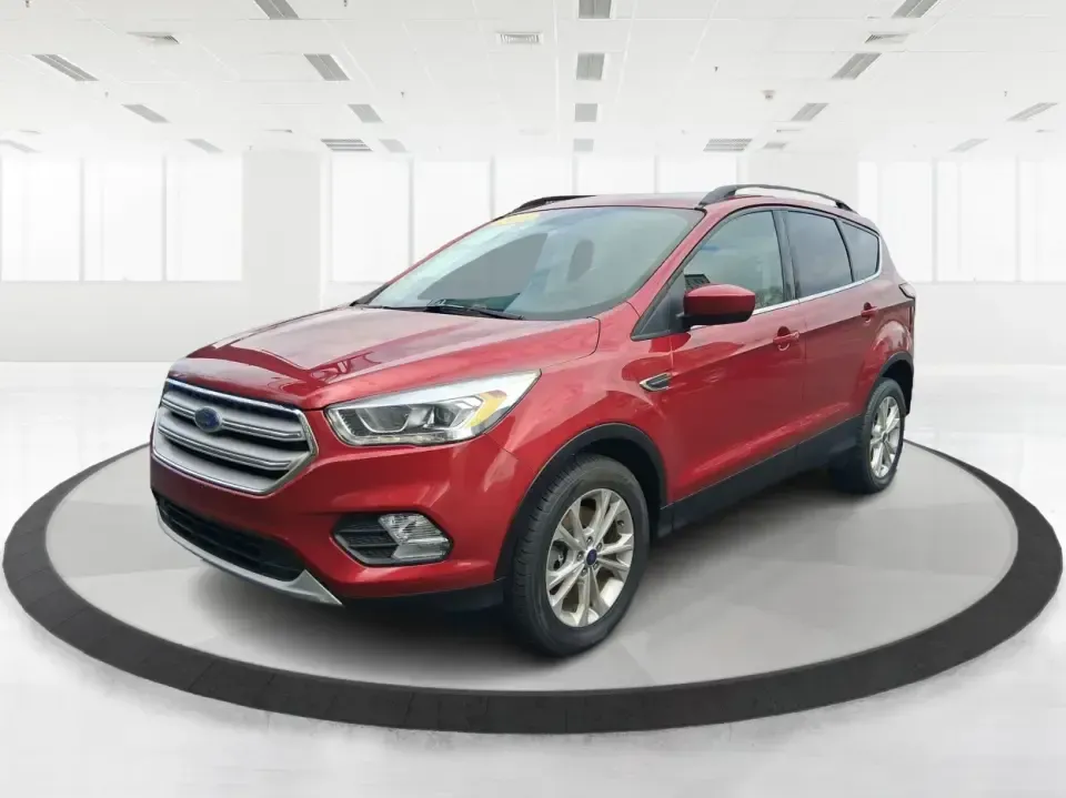 2018 Ford Escape SEL (1FMCU9HD2JU) with an 1.5L L4 DOHC 16V engine, 6A transmission, located at 401 Woodman Dr, Riverside, OH, 45431, (937) 908-9800, 39.760899, -84.123421 - Need a do-it-all SUV that can handle the weekday commute on I-675, quick school drop-offs near Wright-Patterson AFB, and spontaneous weekend getaways to Carillon Historical Park or a lap around Eastwood MetroPark? This 2018 Ford Escape SEL in Ruby Red Metallic Tinted Clearcoat is built for real-life - Photo#8