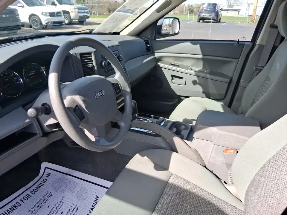 2007 Jeep Grand Cherokee Laredo (1J8GR48K47C) with an 3.7L V6 SOHC 12V engine, 5-Speed Automatic Overdrive transmission, located at 1951 S Dayton Lakeview Rd., New Carlisle, OH, 45344, (937) 908-9800, 39.890999, -84.050255 - Weekend getaways to the trails, winter commutes on slick Ohio roads, and family errands across town all get easier when you're in a capable SUV with true 4WD confidence. This **2007 Jeep Grand Cherokee Laredo** is built for drivers who want classic Jeep utility without giving up everyday comfort-ide - Photo#9