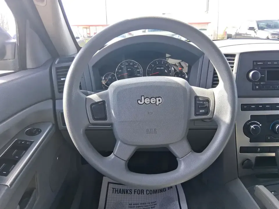 2007 Jeep Grand Cherokee Laredo (1J8GR48K47C) with an 3.7L V6 SOHC 12V engine, 5-Speed Automatic Overdrive transmission, located at 1951 S Dayton Lakeview Rd., New Carlisle, OH, 45344, (937) 908-9800, 39.890999, -84.050255 - Weekend getaways to the trails, winter commutes on slick Ohio roads, and family errands across town all get easier when you're in a capable SUV with true 4WD confidence. This **2007 Jeep Grand Cherokee Laredo** is built for drivers who want classic Jeep utility without giving up everyday comfort-ide - Photo#16