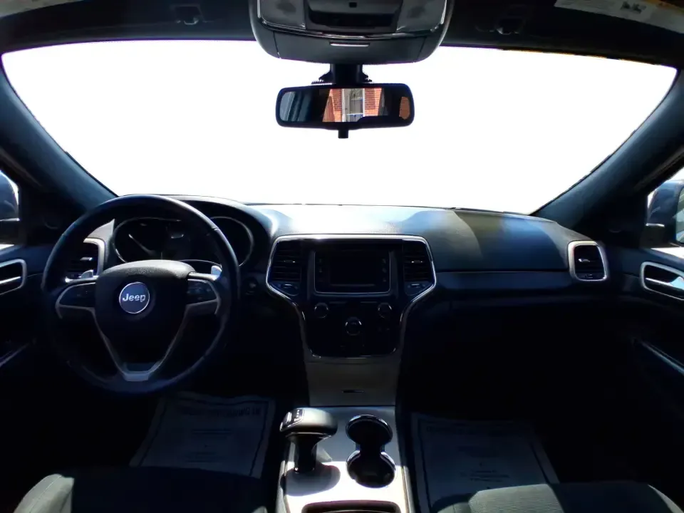 2015 Jeep Grand Cherokee Laredo (1C4RJFAG4FC) with an 3.6L V-6 DOHC engine, 8-Speed Automatic transmission, located at 1230 East Main St, Xenia, OH, 45385, (937) 908-9800, 39.688026, -83.910172 - Weekend getaways to Hocking Hills, confident winter drives to work, and comfortable family errands around town all get easier in a capable SUV like this 2015 Jeep Grand Cherokee Laredo 4WD. Finished in Maximum Steel Metallic Clearcoat, this Grand Cherokee blends rugged Jeep attitude with everyday co - Photo#21