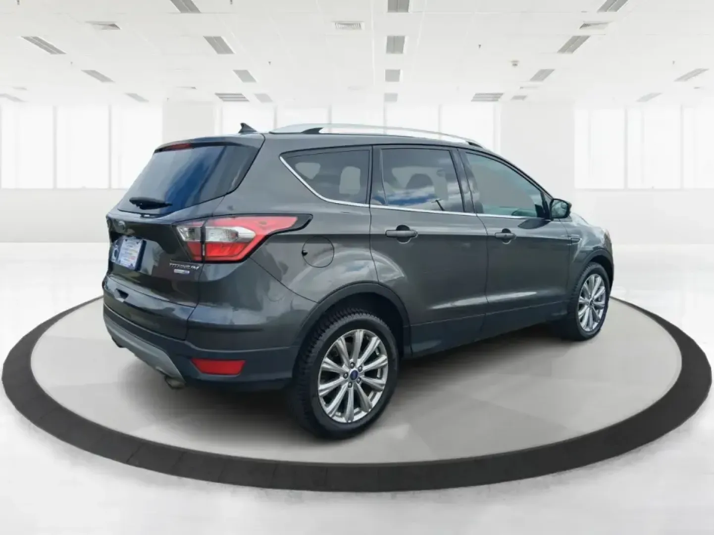 2018 Ford Escape Titanium (1FMCU9J94JU) with an EcoBoost 2L I-4 gasoline direct injection engine, 6A transmission, located at 4508 South Dixie Dr, Moraine, OH, 45439, (937) 908-9800, 39.689976, -84.218452 - Pack up the kids, load the groceries, or point the hood toward a weekend getaway-this 2018 Ford Escape Titanium is the kind of compact SUV that fits real life in Moraine. With confident capability for Ohio weather and a comfortable, tech-forward cabin, it's ideal for long commutes down I-75, quick e - Photo#2