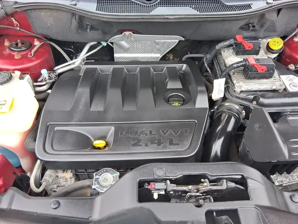 2014 Jeep Patriot Latitude 2WD (1C4NJPFB3ED) with an 2.4L L4 DOHC 16V engine, located at 8750 N County Rd 25A, Piqua, OH, 45356, (937) 908-9800, 40.164391, -84.232513 - Picture a weekday commute down I70 followed by a Saturday escape to parks and backroads around Clark County-this 2014 Jeep Patriot Latitude is the kind of compact SUV that fits both routines without feeling oversized. Finished in Deep Cherry Red Crystal Pearlcoat and showing 90,565 miles, it's a pra- Photo#11