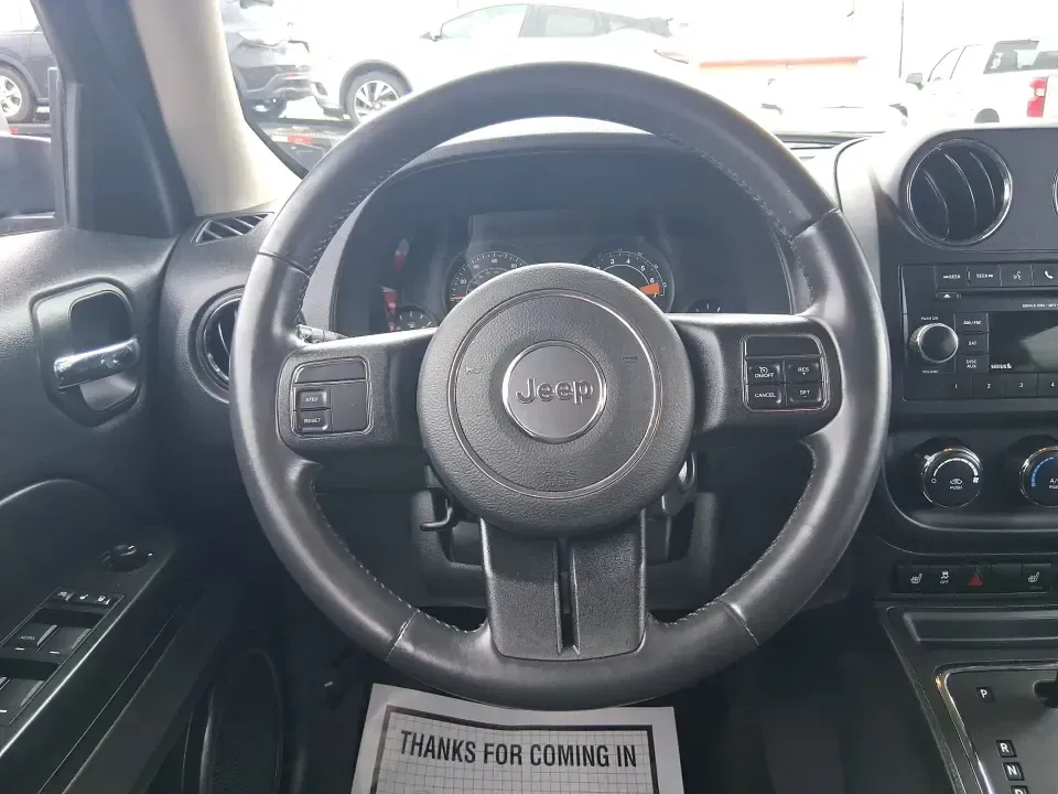 2014 Jeep Patriot Latitude (1C4NJPFB3ED) with an 2.4L L4 DOHC 16V engine, located at 1184 Kauffman Ave, Fairborn, OH, 45324, (937) 908-9800, 39.807072, -84.030914 - Pack up the snacks, cue the playlist, and point the hood toward your next weekend escape-this 2014 Jeep Patriot Latitude is the kind of practical SUV that fits real life in West Central Ohio, whether you're commuting daily, shuttling kids to practice, or chasing fall colors on a backroad drive. Fini - Photo#16