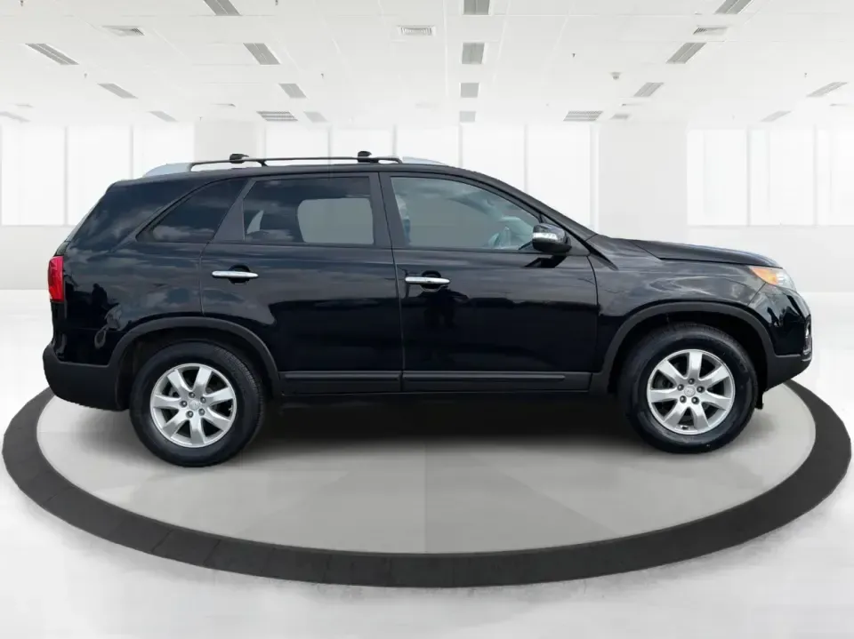 2012 Kia Sorento LX (5XYKT3A68CG) with an 2.4L I-4 gasoline direct injection engine, 6-Speed Automatic transmission, located at 1230 East Main St, Xenia, OH, 45385, (937) 908-9800, 39.688026, -83.910172 - Weekend getaways to John Bryan State Park, daily school drop-offs around Xenia, or an easy commute toward Beavercreek and Dayton-this Ebony Black 2012 Kia Sorento LX is the kind of SUV that fits real life. With practical space, confident road manners, and comfort features you'll appreciate on longer - Photo#1