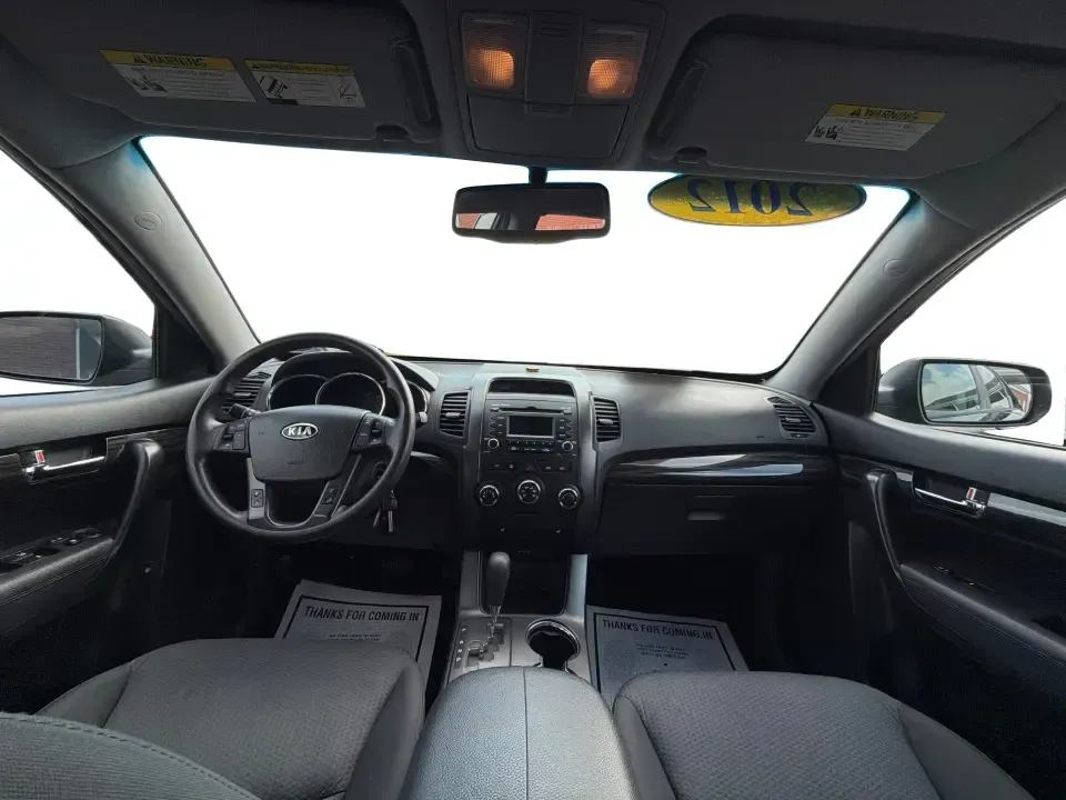 2012 Kia Sorento LX (5XYKT3A68CG) with an 2.4L I-4 gasoline direct injection engine, 6-Speed Automatic transmission, located at 1230 East Main St, Xenia, OH, 45385, (937) 908-9800, 39.688026, -83.910172 - Weekend getaways to John Bryan State Park, daily school drop-offs around Xenia, or an easy commute toward Beavercreek and Dayton-this Ebony Black 2012 Kia Sorento LX is the kind of SUV that fits real life. With practical space, confident road manners, and comfort features you'll appreciate on longer - Photo#19