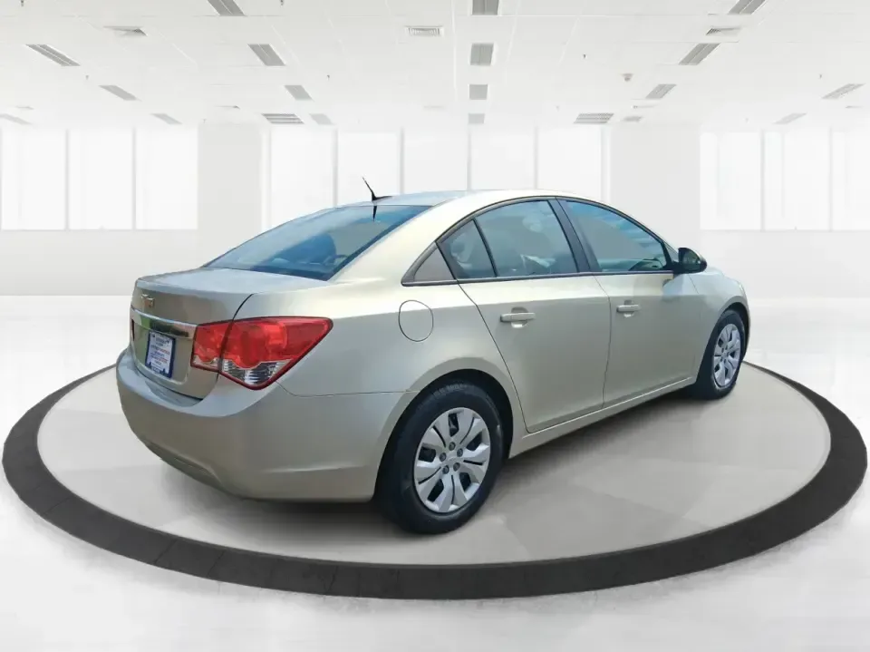 2013 Chevrolet Cruze LS Auto (1G1PA5SH4D7) with an ECOTEC 1.8L I-4 DOHC engine, 6-Speed Automatic transmission, located at 1184 Kauffman Ave, Fairborn, OH, 45324, (937) 908-9800, 39.807072, -84.030914 - Make your weekdays easier and your weekends more spontaneous with a sedan that's built for real life in Fairborn-whether you're commuting to Wright-Patterson AFB, running errands between Beavercreek and Huber Heights, or planning a quick road trip down I-675. This **2013 Chevrolet Cruze LS Auto** de - Photo#2