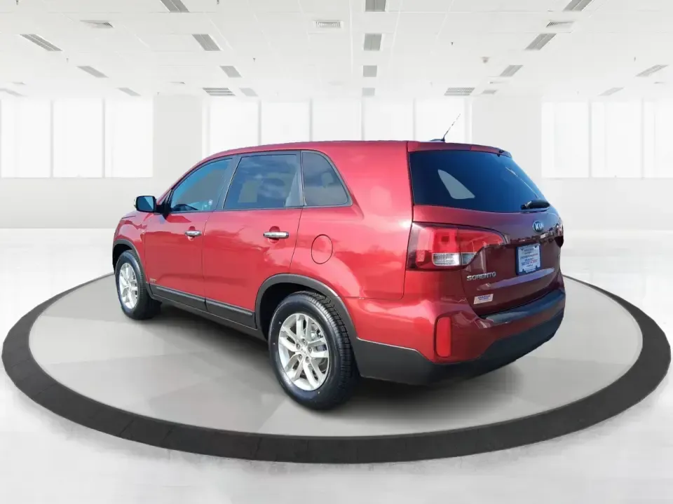 2014 Kia Sorento LX (5XYKTCA65EG) with an 2.4L I-4 gasoline direct injection engine, 6-Speed Automatic transmission, located at 1230 East Main St, Xenia, OH, 45385, (937) 908-9800, 39.688026, -83.910172 - Need one SUV that can handle Ohio winters, school drop-offs, and spontaneous weekend getaways to Indian Lake or a day trip to Dayton? This 2014 Kia Sorento LX in eye-catching Remington Red Metallic is a practical, confidence-building choice for busy families, commuters, and adventure-minded drivers - Photo#4