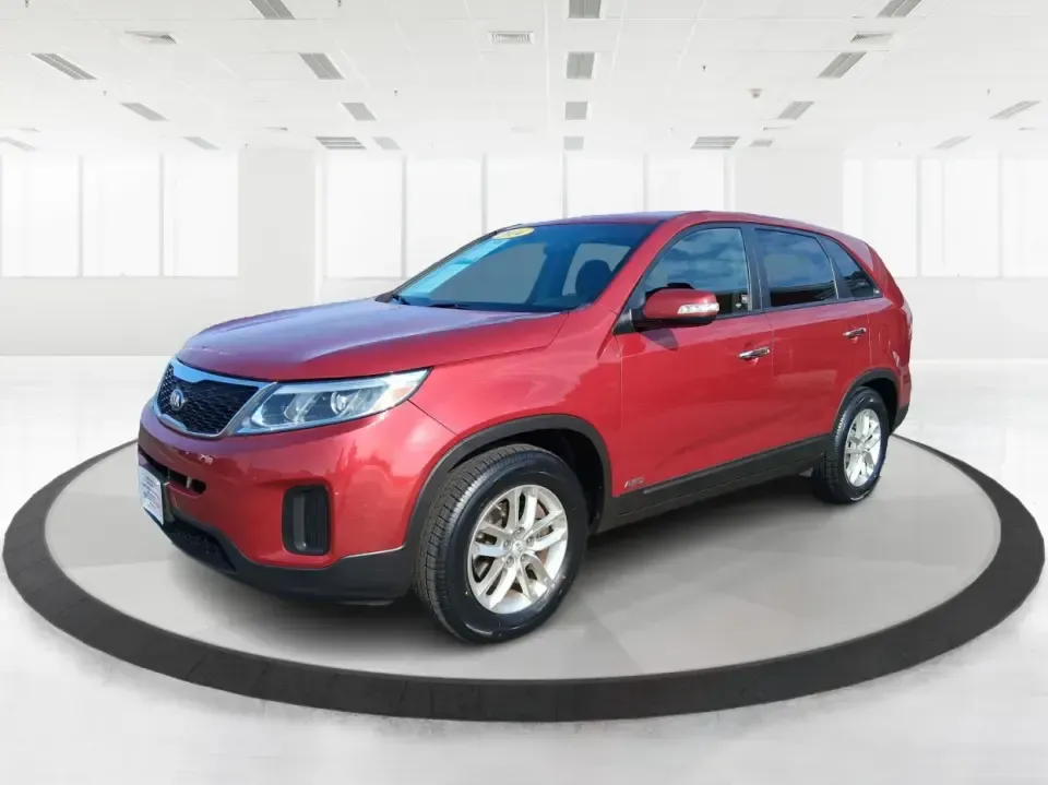 2014 Kia Sorento LX (5XYKTCA65EG) with an 2.4L I-4 gasoline direct injection engine, 6-Speed Automatic transmission, located at 1230 East Main St, Xenia, OH, 45385, (937) 908-9800, 39.688026, -83.910172 - Need one SUV that can handle Ohio winters, school drop-offs, and spontaneous weekend getaways to Indian Lake or a day trip to Dayton? This 2014 Kia Sorento LX in eye-catching Remington Red Metallic is a practical, confidence-building choice for busy families, commuters, and adventure-minded drivers - Photo#8