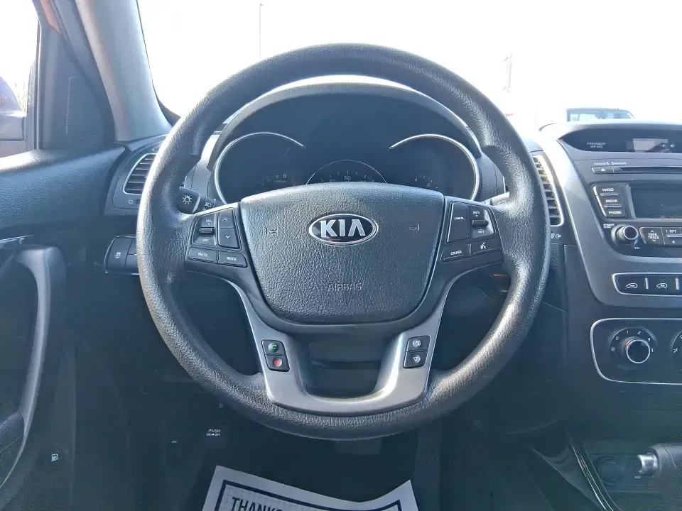 2014 Kia Sorento LX (5XYKTCA65EG) with an 2.4L I-4 gasoline direct injection engine, 6-Speed Automatic transmission, located at 1230 East Main St, Xenia, OH, 45385, (937) 908-9800, 39.688026, -83.910172 - Need one SUV that can handle Ohio winters, school drop-offs, and spontaneous weekend getaways to Indian Lake or a day trip to Dayton? This 2014 Kia Sorento LX in eye-catching Remington Red Metallic is a practical, confidence-building choice for busy families, commuters, and adventure-minded drivers - Photo#16