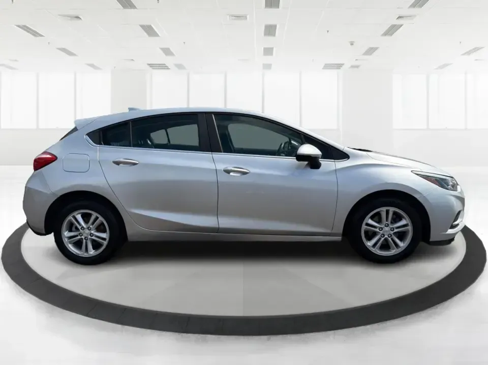 2018 Chevrolet Cruze LT Auto (3G1BE6SM8JS) with an 1.4L I-4 gasoline direct injection engine, 6A transmission, located at 880 E. National Road, Vandalia, OH, 45377, (937) 908-9800, 39.891918, -84.183594 - Pack the car, cue up your favorite playlist, and head out for a weekend getaway-this 2018 Chevrolet Cruze LT Auto Hatchback is the kind of practical, fuel-sipping daily driver that also shines for road trips, errands, and campus or work commutes around Vandalia. With its easy-to-park hatchback versa - Photo#1