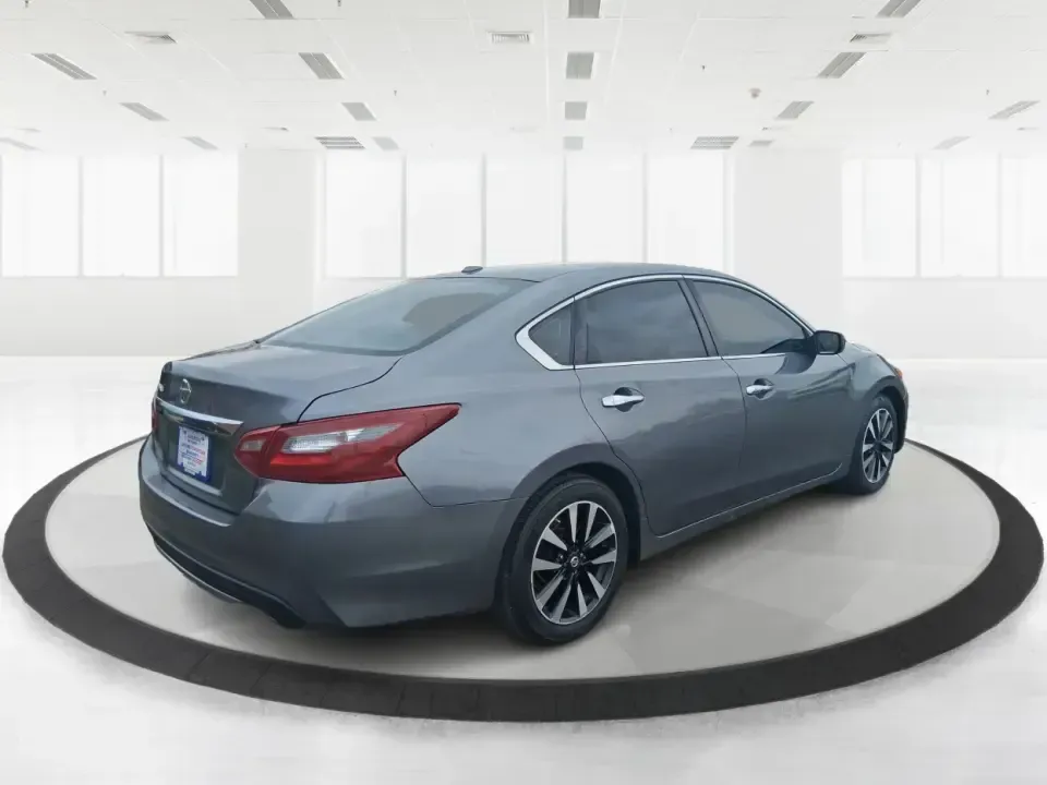 2018 Nissan Altima 2.5 SV (1N4AL3AP0JC) with an 2.5L I-4 DOHC engine, CVT transmission, located at 8750 N County Rd 25A, Piqua, OH, 45356, (937) 908-9800, 40.164391, -84.232513 - Make every mile easier-whether you're tackling a long commute down I75, running kids to practice after school, or planning a weekend day trip to the Miami County Fairgrounds. This 2018 Nissan Altima 2.5 SV in Gun Metallic is the kind of comfortable, efficient sedan that fits real-life schedules in P - Photo#2