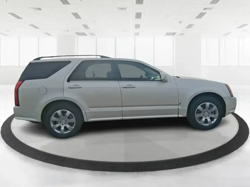 2007 Cadillac SRX V6 (1GYEE637370) with an 3.6L V-6 DOHC engine, 5-Speed Automatic Overdrive transmission, located at 8750 N County Rd 25A, Piqua, OH, 45356, (937) 908-9800, 40.164391, -84.232513 - Make your daily commute up I75 feel first-class, turn school drop-offs into a comfortable routine, and still have an SUV ready for weekend runs to Indian Lake or a quick getaway to downtown Troy. This 2007 Cadillac SRX V6 delivers the kind of upscale ride and practical versatility that fits real lif - Photo#1