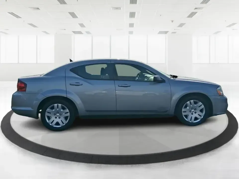 2014 Dodge Avenger SE (1C3CDZAB8EN) with an 2.4L L4 DOHC 16V engine, 4-Speed Automatic transmission, located at 1099 N County Rd 25A , Troy, OH, 45373, (937) 908-9800, 40.057079, -84.212883 - Picture an easy, stress-free daily commute from Moraine to downtown Dayton, with enough comfort for the school run, errands along South Dixie Drive, and the occasional weekend escape to Carillon Historical Park or a movie night near the Dayton Mall. If you want a practical sedan that fits real life- - Photo#1