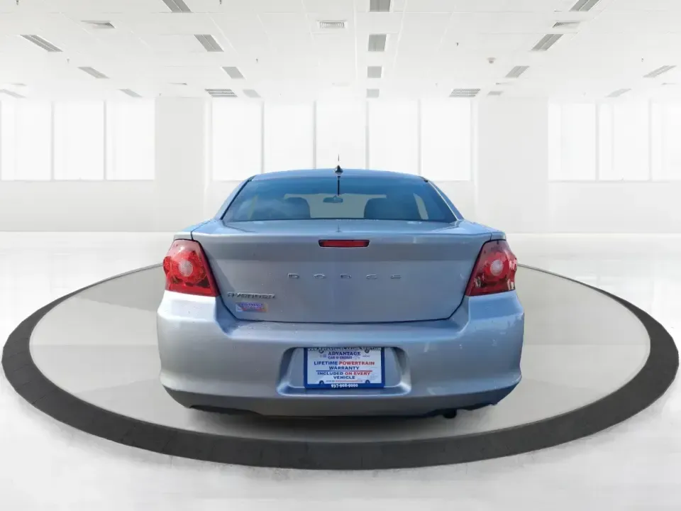 2014 Dodge Avenger SE (1C3CDZAB8EN) with an 2.4L L4 DOHC 16V engine, 4-Speed Automatic transmission, located at 1099 N County Rd 25A , Troy, OH, 45373, (937) 908-9800, 40.057079, -84.212883 - Picture an easy, stress-free daily commute from Moraine to downtown Dayton, with enough comfort for the school run, errands along South Dixie Drive, and the occasional weekend escape to Carillon Historical Park or a movie night near the Dayton Mall. If you want a practical sedan that fits real life- - Photo#3