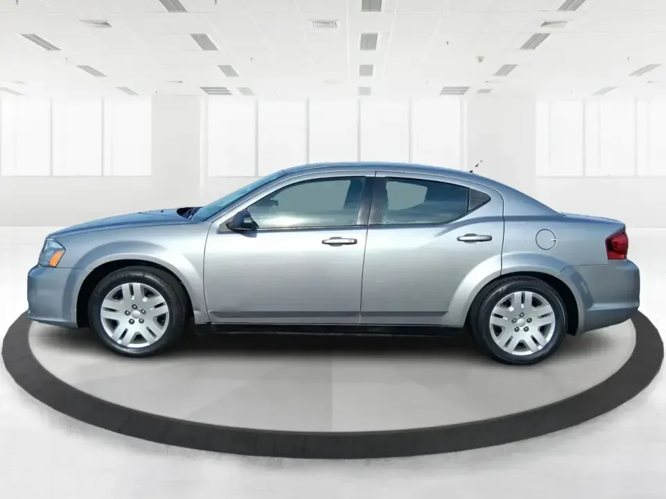 2014 Dodge Avenger SE (1C3CDZAB8EN) with an 2.4L L4 DOHC 16V engine, 4-Speed Automatic transmission, located at 1099 N County Rd 25A , Troy, OH, 45373, (937) 908-9800, 40.057079, -84.212883 - Picture an easy, stress-free daily commute from Moraine to downtown Dayton, with enough comfort for the school run, errands along South Dixie Drive, and the occasional weekend escape to Carillon Historical Park or a movie night near the Dayton Mall. If you want a practical sedan that fits real life- - Photo#5