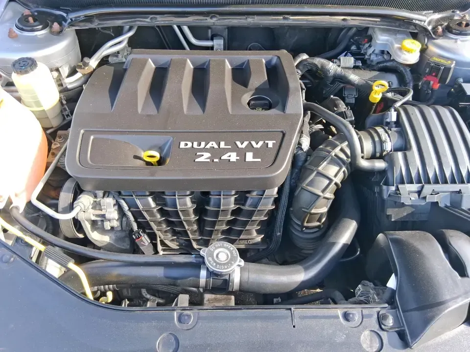 2014 Dodge Avenger SE (1C3CDZAB8EN) with an 2.4L L4 DOHC 16V engine, 4-Speed Automatic transmission, located at 1099 N County Rd 25A , Troy, OH, 45373, (937) 908-9800, 40.057079, -84.212883 - Picture an easy, stress-free daily commute from Moraine to downtown Dayton, with enough comfort for the school run, errands along South Dixie Drive, and the occasional weekend escape to Carillon Historical Park or a movie night near the Dayton Mall. If you want a practical sedan that fits real life- - Photo#11