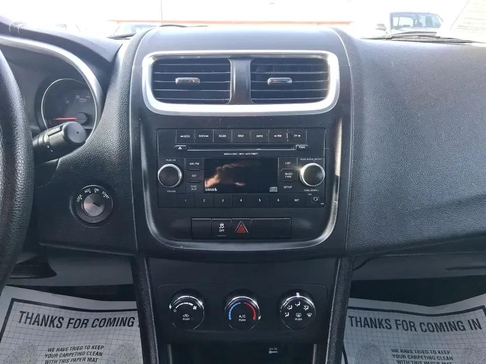 2014 Dodge Avenger SE (1C3CDZAB8EN) with an 2.4L L4 DOHC 16V engine, 4-Speed Automatic transmission, located at 1099 N County Rd 25A , Troy, OH, 45373, (937) 908-9800, 40.057079, -84.212883 - Picture an easy, stress-free daily commute from Moraine to downtown Dayton, with enough comfort for the school run, errands along South Dixie Drive, and the occasional weekend escape to Carillon Historical Park or a movie night near the Dayton Mall. If you want a practical sedan that fits real life- - Photo#13