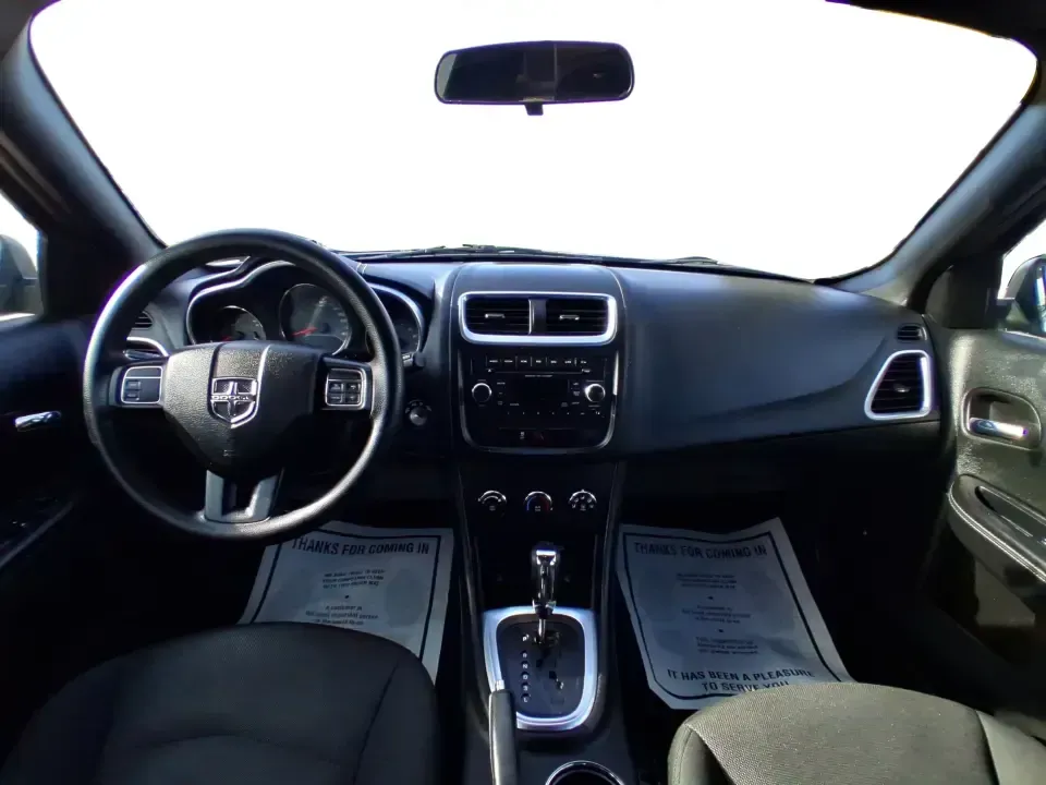 2014 Dodge Avenger SE (1C3CDZAB8EN) with an 2.4L L4 DOHC 16V engine, 4-Speed Automatic transmission, located at 1099 N County Rd 25A , Troy, OH, 45373, (937) 908-9800, 40.057079, -84.212883 - Picture an easy, stress-free daily commute from Moraine to downtown Dayton, with enough comfort for the school run, errands along South Dixie Drive, and the occasional weekend escape to Carillon Historical Park or a movie night near the Dayton Mall. If you want a practical sedan that fits real life- - Photo#19