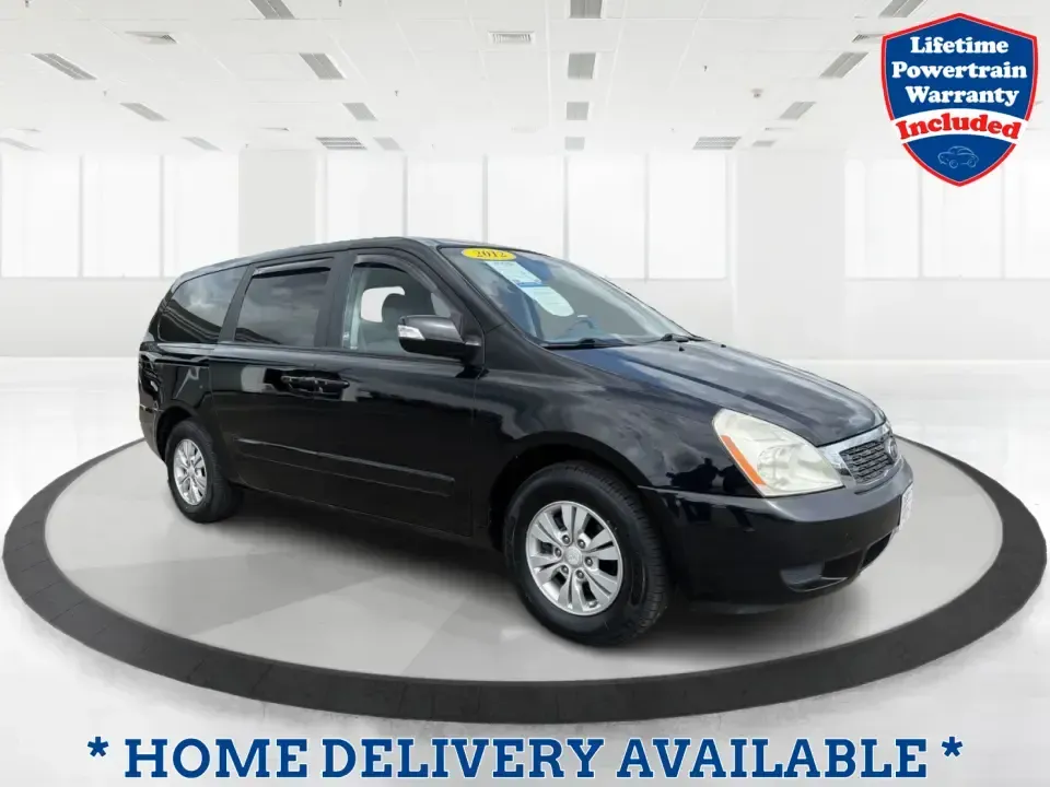 2012 Kia Sedona LX (KNDMG4C78C6) with an 3.5L V-6 DOHC engine, 5-Speed Automatic transmission, located at 401 Woodman Dr, Riverside, OH, 45431, (937) 908-9800, 39.760899, -84.123421 - Picture the next family road trip, soccer Saturday, or airport pickup where everyone actually fits comfortably-plus there's room left for groceries, strollers, and weekend gear. This 2012 Kia Sedona LX in Aurora Black is built for real life: school drop-offs, long commutes across the Miami Valley, a - Photo#0