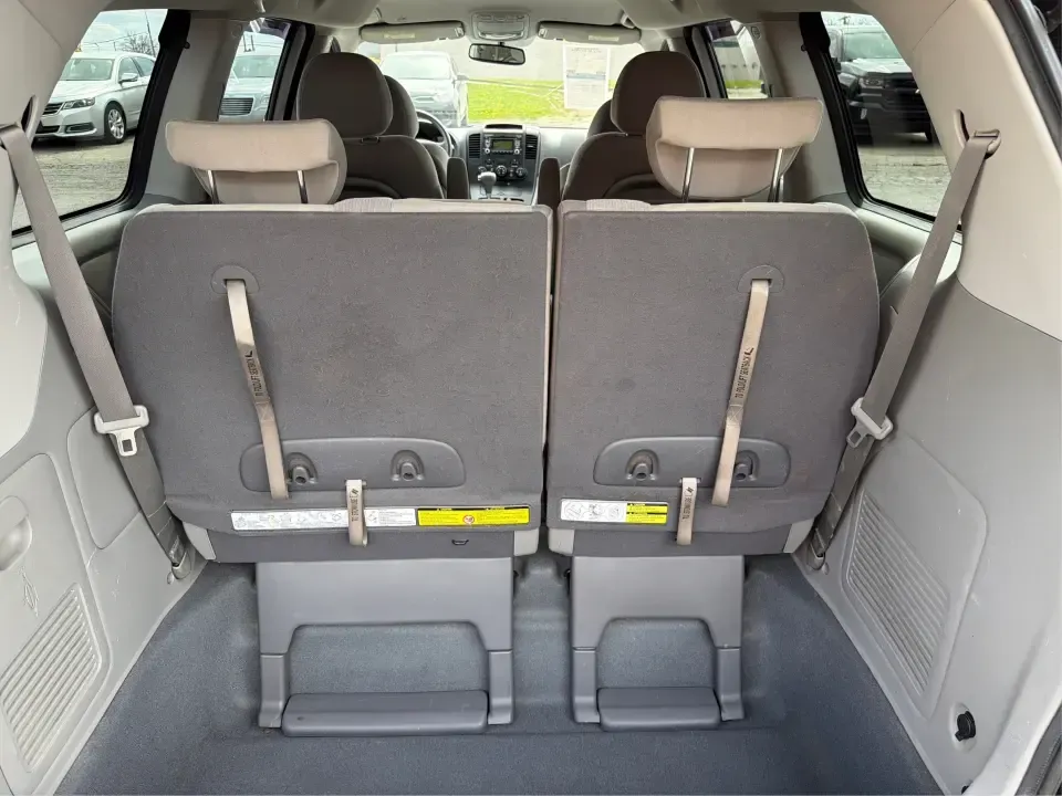 2012 Kia Sedona LX (KNDMG4C78C6) with an 3.5L V-6 DOHC engine, 5-Speed Automatic transmission, located at 401 Woodman Dr, Riverside, OH, 45431, (937) 908-9800, 39.760899, -84.123421 - Picture the next family road trip, soccer Saturday, or airport pickup where everyone actually fits comfortably-plus there's room left for groceries, strollers, and weekend gear. This 2012 Kia Sedona LX in Aurora Black is built for real life: school drop-offs, long commutes across the Miami Valley, a - Photo#12