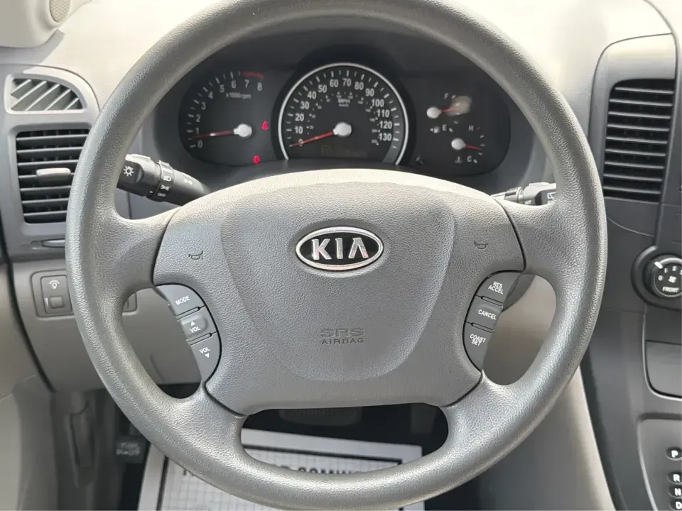 2012 Kia Sedona LX (KNDMG4C78C6) with an 3.5L V-6 DOHC engine, 5-Speed Automatic transmission, located at 401 Woodman Dr, Riverside, OH, 45431, (937) 908-9800, 39.760899, -84.123421 - Picture the next family road trip, soccer Saturday, or airport pickup where everyone actually fits comfortably-plus there's room left for groceries, strollers, and weekend gear. This 2012 Kia Sedona LX in Aurora Black is built for real life: school drop-offs, long commutes across the Miami Valley, a - Photo#16