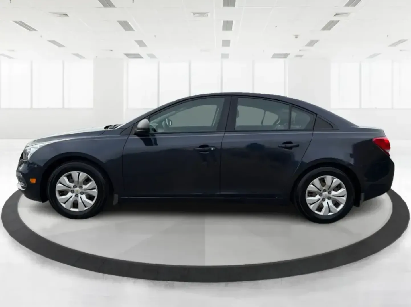 2016 Chevrolet Cruze Limited LS Auto (1G1PC5SG5G7) with an ECOTEC 1.8L I-4 DOHC engine, 6A transmission, located at 1099 N County Rd 25A , Troy, OH, 45373, (937) 908-9800, 40.057079, -84.212883 - Need a dependable, fuel-friendly commuter that can handle daily drives from Troy to Dayton, school drop-offs, and the occasional weekend getaway without draining your budget? This 2016 Chevrolet Cruze Limited LS Auto is the kind of practical sedan that fits real life-easy to park downtown, comfortab - Photo#5