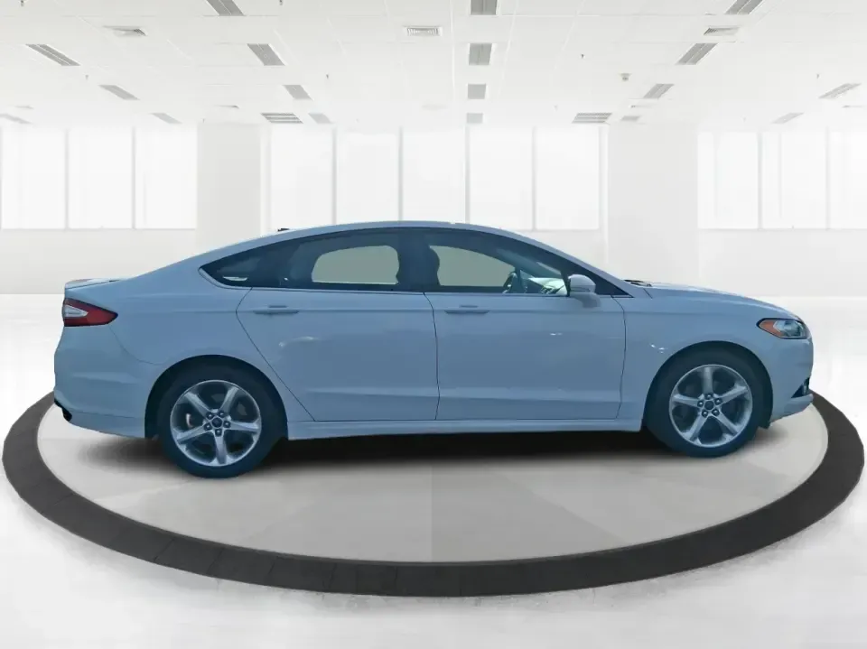 2016 Ford Fusion SE (3FA6P0H91GR) with an 2.0L L4 DOHC 16V engine, 6-Speed Automatic transmission, located at 880 E. National Road, Vandalia, OH, 45377, (937) 908-9800, 39.891918, -84.183594 - Need a dependable commuter that can handle I75 traffic, school drop-offs, and weekend runs to Dayton without draining your budget? This 2016 Ford Fusion SE in Oxford White is the kind of practical, comfortable sedan that fits real life in Vandalia-smooth for daily driving, efficient on regular unlea - Photo#1