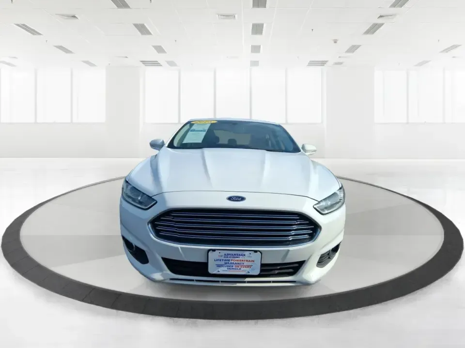2016 Ford Fusion SE (3FA6P0H91GR) with an 2.0L L4 DOHC 16V engine, 6-Speed Automatic transmission, located at 880 E. National Road, Vandalia, OH, 45377, (937) 908-9800, 39.891918, -84.183594 - Need a dependable commuter that can handle I75 traffic, school drop-offs, and weekend runs to Dayton without draining your budget? This 2016 Ford Fusion SE in Oxford White is the kind of practical, comfortable sedan that fits real life in Vandalia-smooth for daily driving, efficient on regular unlea - Photo#7