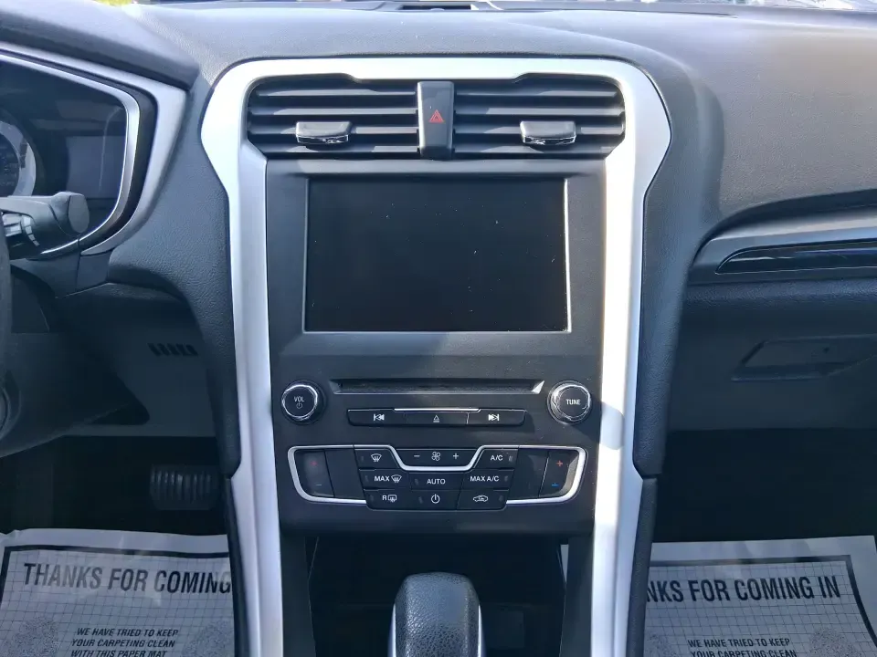 2016 Ford Fusion SE (3FA6P0H91GR) with an 2.0L L4 DOHC 16V engine, 6-Speed Automatic transmission, located at 880 E. National Road, Vandalia, OH, 45377, (937) 908-9800, 39.891918, -84.183594 - Need a dependable commuter that can handle I75 traffic, school drop-offs, and weekend runs to Dayton without draining your budget? This 2016 Ford Fusion SE in Oxford White is the kind of practical, comfortable sedan that fits real life in Vandalia-smooth for daily driving, efficient on regular unlea - Photo#13