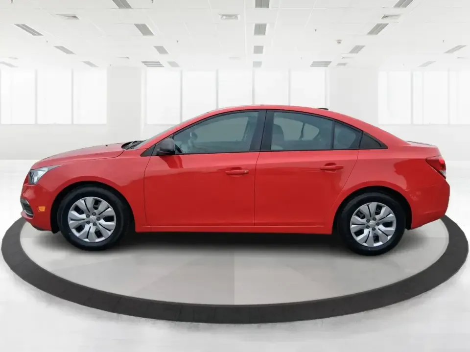 2015 Chevrolet Cruze LS Auto (1G1PA5SG9F7) with an ECOTEC 1.8L I-4 DOHC engine, 6-Speed Automatic transmission, located at 8750 N County Rd 25A, Piqua, OH, 45356, (937) 908-9800, 40.164391, -84.232513 - Picture an easy, affordable daily commute that still feels comfortable on I75, quick trips to downtown Piqua for dinner, and weekend errands that don't drain your budget at the pump. This 2015 Chevrolet Cruze LS Auto in eye-catching Red Hot is a smart, practical sedan for commuters, first-time buyer - Photo#5