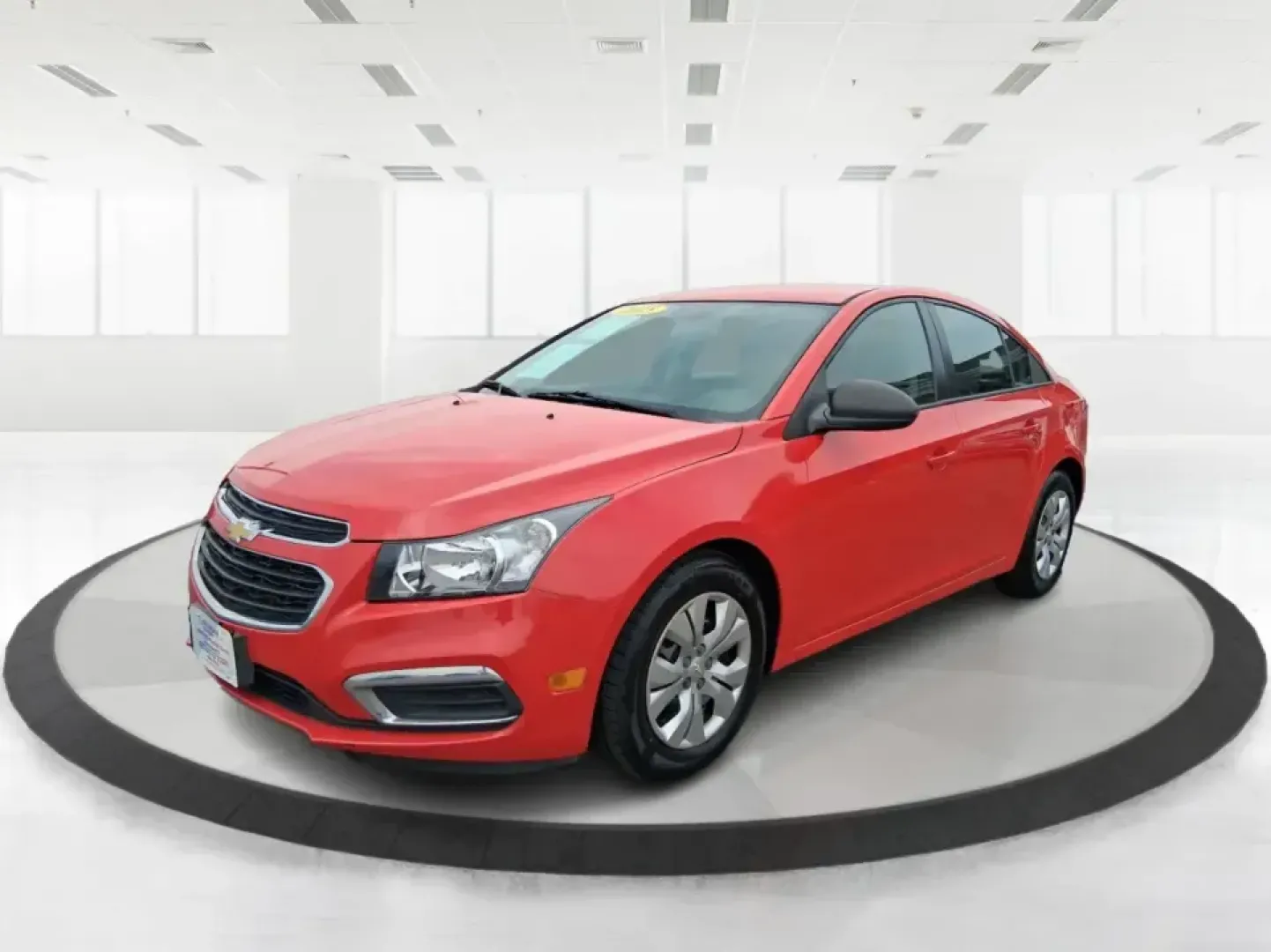 2015 Chevrolet Cruze LS Auto (1G1PA5SG9F7) with an ECOTEC 1.8L I-4 DOHC engine, 6-Speed Automatic transmission, located at 8750 N County Rd 25A, Piqua, OH, 45356, (937) 908-9800, 40.164391, -84.232513 - Picture an easy, affordable daily commute that still feels comfortable on I75, quick trips to downtown Piqua for dinner, and weekend errands that don't drain your budget at the pump. This 2015 Chevrolet Cruze LS Auto in eye-catching Red Hot is a smart, practical sedan for commuters, first-time buyer - Photo#8
