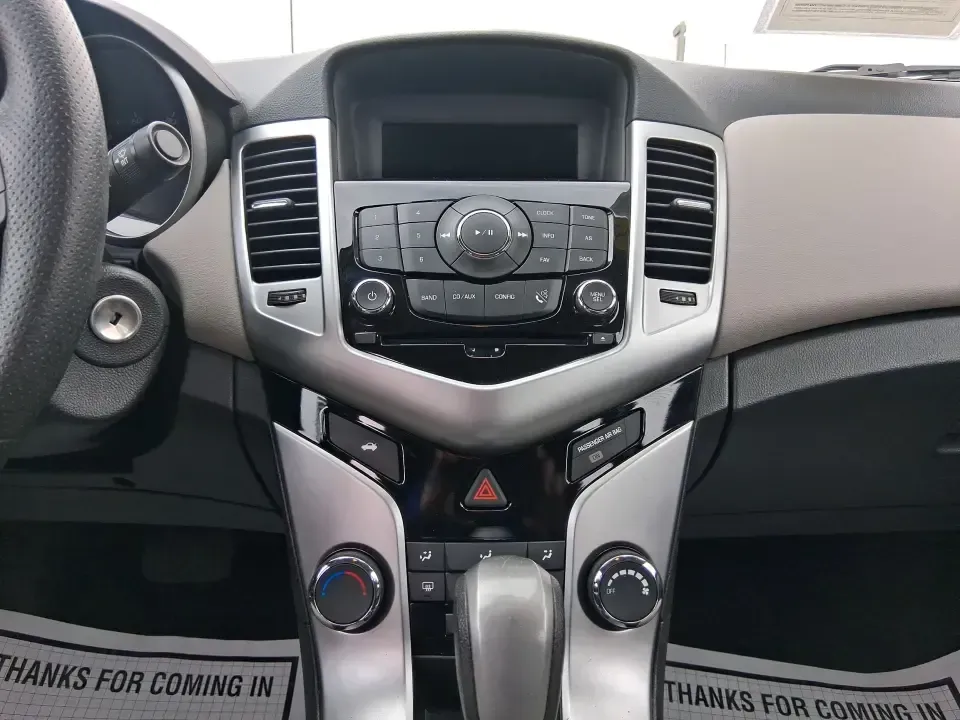 2015 Chevrolet Cruze LS Auto (1G1PA5SG9F7) with an ECOTEC 1.8L I-4 DOHC engine, 6-Speed Automatic transmission, located at 8750 N County Rd 25A, Piqua, OH, 45356, (937) 908-9800, 40.164391, -84.232513 - Picture an easy, affordable daily commute that still feels comfortable on I75, quick trips to downtown Piqua for dinner, and weekend errands that don't drain your budget at the pump. This 2015 Chevrolet Cruze LS Auto in eye-catching Red Hot is a smart, practical sedan for commuters, first-time buyer - Photo#13