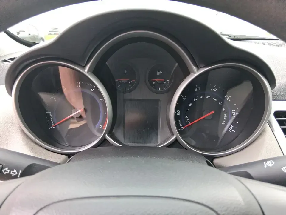 2015 Chevrolet Cruze LS Auto (1G1PA5SG9F7) with an ECOTEC 1.8L I-4 DOHC engine, 6-Speed Automatic transmission, located at 8750 N County Rd 25A, Piqua, OH, 45356, (937) 908-9800, 40.164391, -84.232513 - Picture an easy, affordable daily commute that still feels comfortable on I75, quick trips to downtown Piqua for dinner, and weekend errands that don't drain your budget at the pump. This 2015 Chevrolet Cruze LS Auto in eye-catching Red Hot is a smart, practical sedan for commuters, first-time buyer - Photo#15