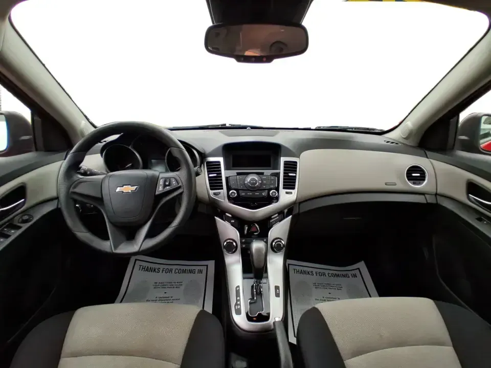 2015 Chevrolet Cruze LS Auto (1G1PA5SG9F7) with an ECOTEC 1.8L I-4 DOHC engine, 6-Speed Automatic transmission, located at 8750 N County Rd 25A, Piqua, OH, 45356, (937) 908-9800, 40.164391, -84.232513 - Picture an easy, affordable daily commute that still feels comfortable on I75, quick trips to downtown Piqua for dinner, and weekend errands that don't drain your budget at the pump. This 2015 Chevrolet Cruze LS Auto in eye-catching Red Hot is a smart, practical sedan for commuters, first-time buyer - Photo#20