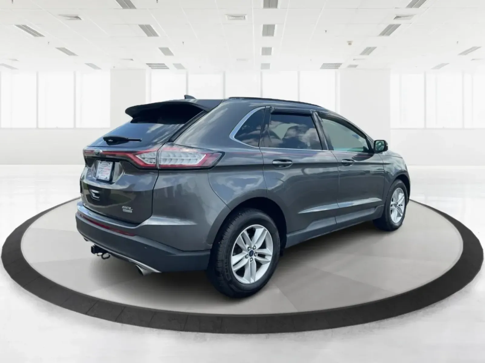 2016 Ford Edge SEL (2FMPK3J91GB) with an 3.5L V-6 DOHC engine, located at 1099 N County Rd 25A , Troy, OH, 45373, (937) 908-9800, 40.057079, -84.212883 - **Experience the Road Ahead with the 2016 Ford Edge SEL - Your Adventure Awaits!**<br /> <br /> Are you ready for your next road trip or family outing? The 2016 Ford Edge SEL is not just a car; it's a versatile SUV that caters to your lifestyle needs, making it the perfect companion for growing fami - Photo#2